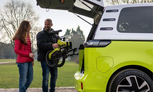 fold ebike being put into a campervan